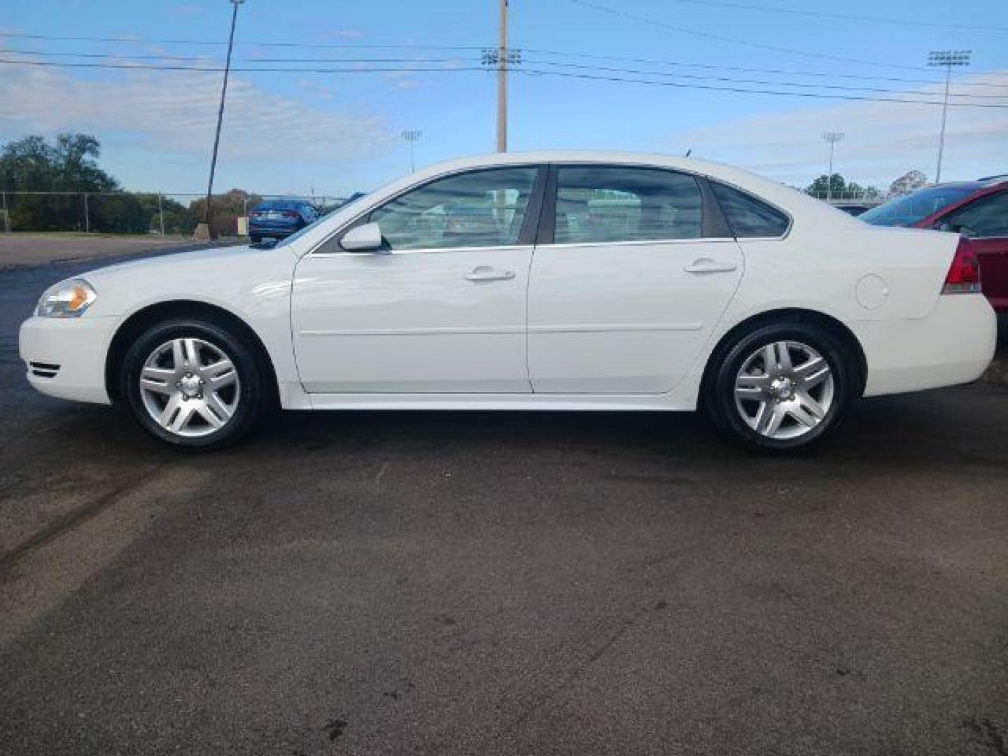 2013 White Chevrolet Impala LT (Fleet) (2G1WG5E34D1) with an 3.6L V6 DOHC 16V FFV engine, 6-Speed Automatic transmission, located at 1951 S Dayton Lakeview Rd., New Carlisle, OH, 45344, (937) 908-9800, 39.890999, -84.050255 - Photo#3