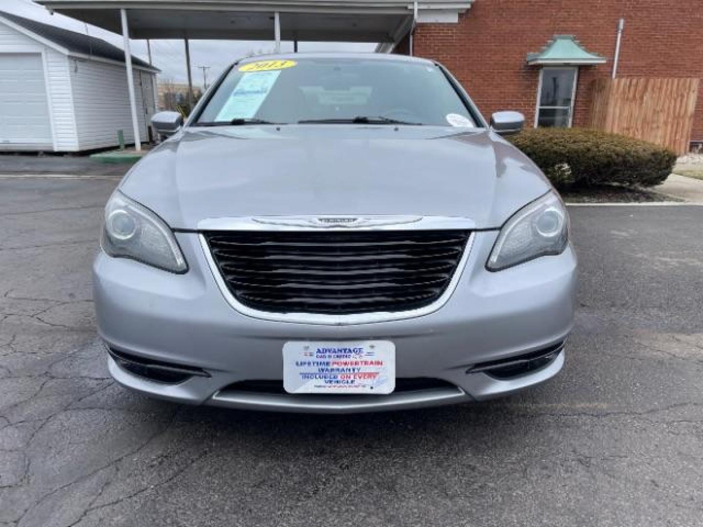 2013 Billet Silver Metallic Chrysler 200 Touring (1C3CCBBG8DN) with an 3.6L V6 DOHC 24V FFV engine, 6-Speed Automatic transmission, located at 4508 South Dixie Dr, Moraine, OH, 45439, (937) 908-9800, 39.689976, -84.218452 - Photo#4