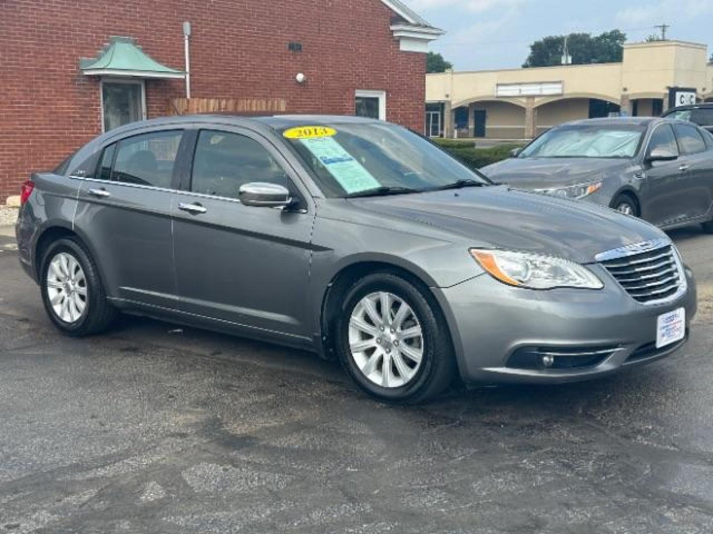 2013 Tungsten Metallic Chrysler 200 Limited (1C3CCBCG3DN) with an 3.6L V6 DOHC 24V FFV engine, 6-Speed Automatic transmission, located at 1230 East Main St, Xenia, OH, 45385, (937) 908-9800, 39.688026, -83.910172 - Photo#0