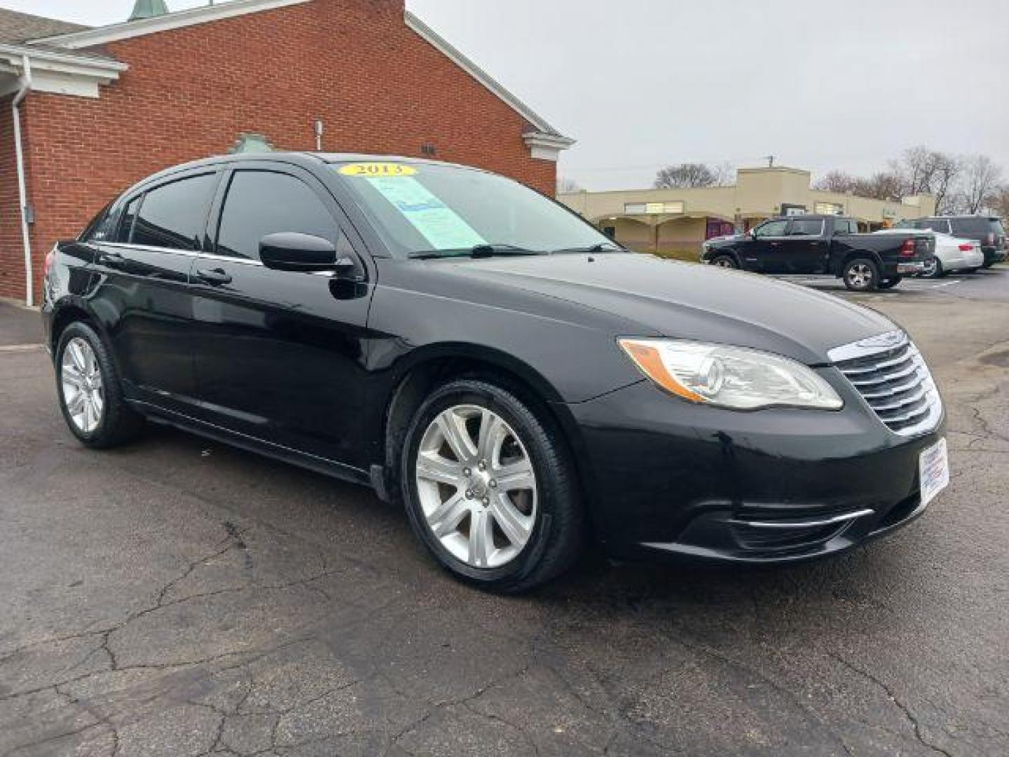 2013 Black Chrysler 200 Touring (1C3CCBBB8DN) with an 2.4L L4 DOHC 16V engine, 6-Speed Automatic transmission, located at 401 Woodman Dr, Riverside, OH, 45431, (937) 908-9800, 39.760899, -84.123421 - Photo#0