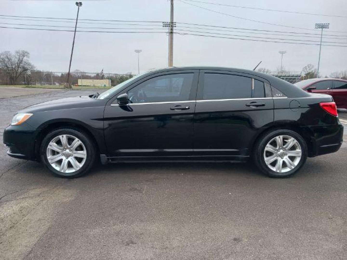 2013 Black Chrysler 200 Touring (1C3CCBBB8DN) with an 2.4L L4 DOHC 16V engine, 6-Speed Automatic transmission, located at 401 Woodman Dr, Riverside, OH, 45431, (937) 908-9800, 39.760899, -84.123421 - Photo#3