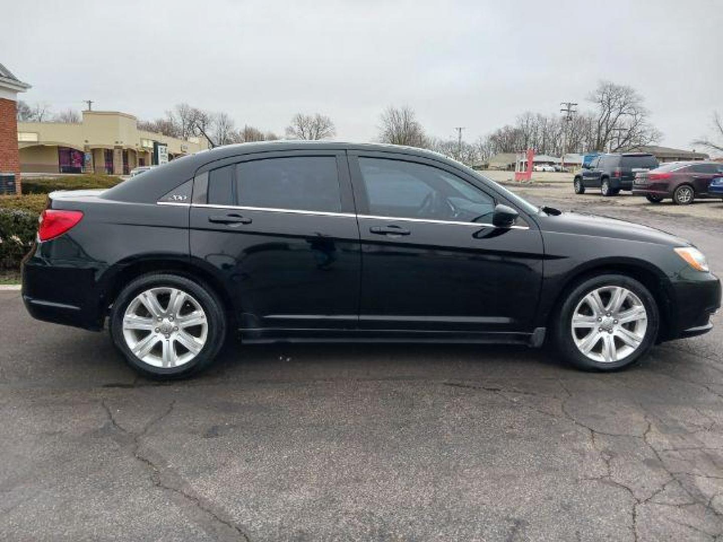 2013 Black Chrysler 200 Touring (1C3CCBBB8DN) with an 2.4L L4 DOHC 16V engine, 6-Speed Automatic transmission, located at 401 Woodman Dr, Riverside, OH, 45431, (937) 908-9800, 39.760899, -84.123421 - Photo#4