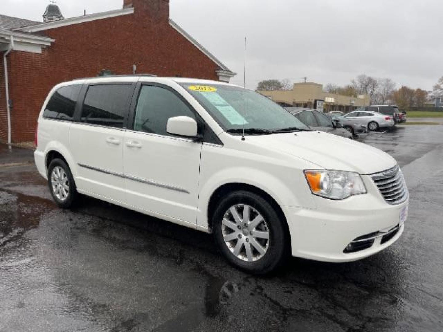 2013 Stone White Chrysler Town and Country Touring (2C4RC1BG7DR) with an 3.6L V6 DOHC 24V engine, 6-Speed Automatic transmission, located at 401 Woodman Dr, Riverside, OH, 45431, (937) 908-9800, 39.760899, -84.123421 - Photo#0