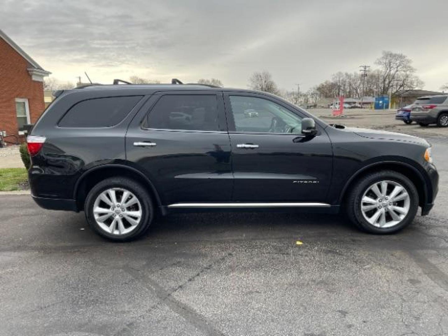 2013 Brilliant Black Crystal Pearl Dodge Durango Crew AWD (1C4RDJDG4DC) with an 3.6L V6 DOHC 24V engine, 5-Speed Automatic transmission, located at 1099 N County Rd 25A, Troy, OH, 45373, (937) 908-9800, 40.057079, -84.212883 - Photo#2