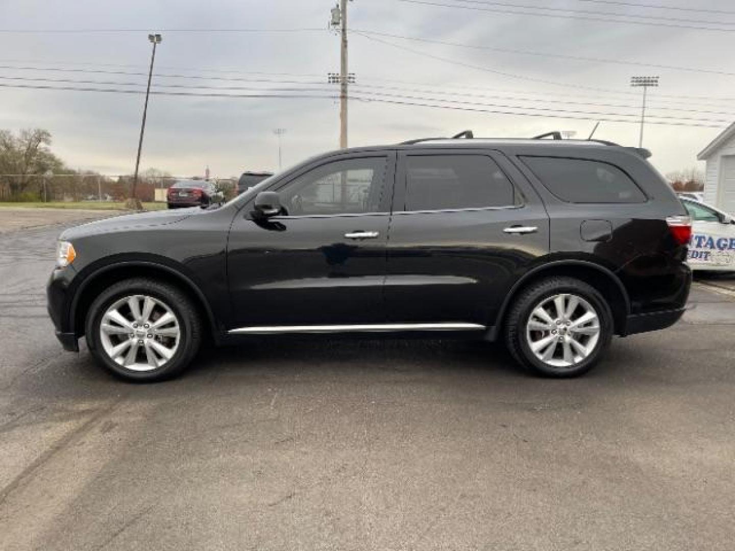 2013 Brilliant Black Crystal Pearl Dodge Durango Crew AWD (1C4RDJDG4DC) with an 3.6L V6 DOHC 24V engine, 5-Speed Automatic transmission, located at 1099 N County Rd 25A, Troy, OH, 45373, (937) 908-9800, 40.057079, -84.212883 - Photo#3