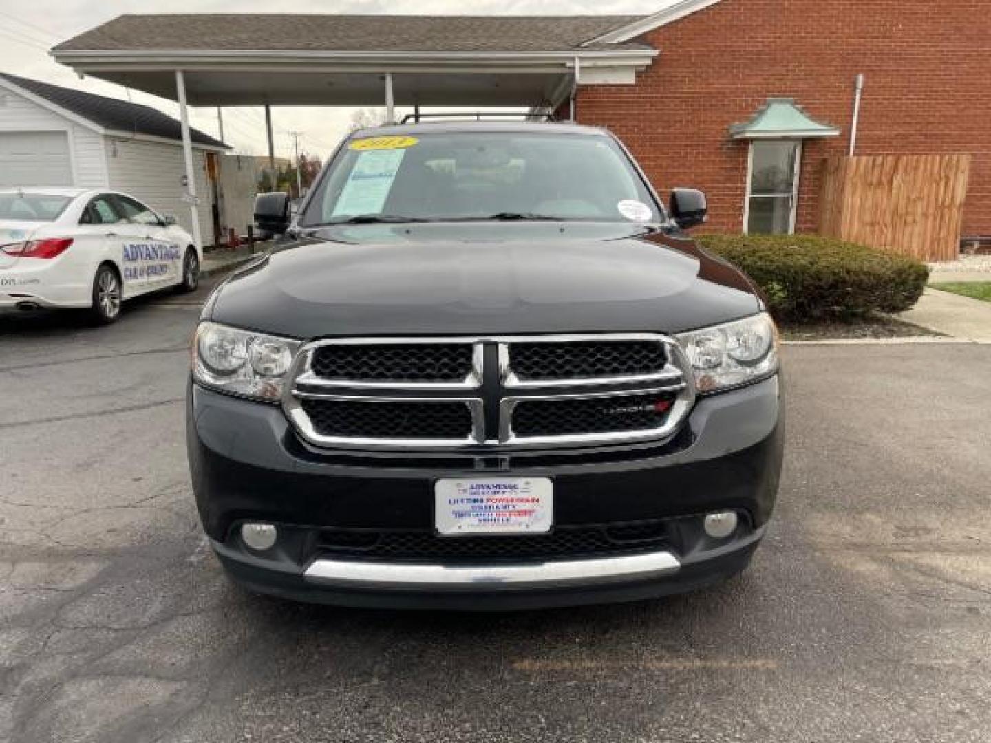 2013 Brilliant Black Crystal Pearl Dodge Durango Crew AWD (1C4RDJDG4DC) with an 3.6L V6 DOHC 24V engine, 5-Speed Automatic transmission, located at 1099 N County Rd 25A, Troy, OH, 45373, (937) 908-9800, 40.057079, -84.212883 - Photo#4