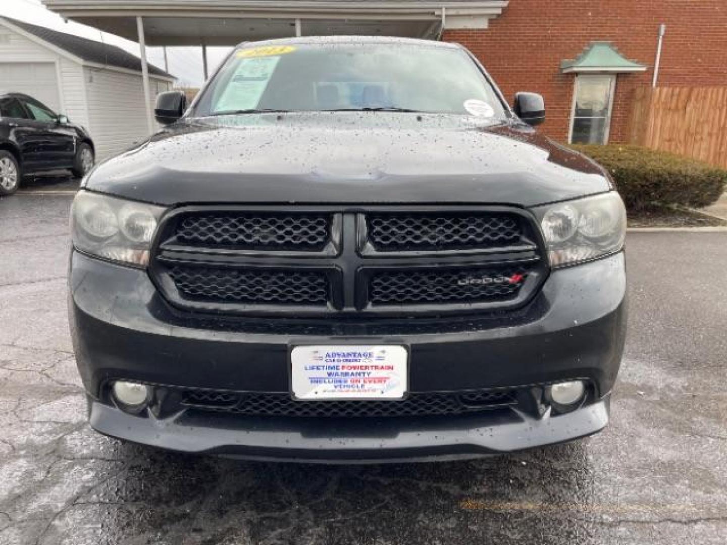 2013 Brilliant Black Crystal Pearl Dodge Durango SXT AWD (1C4RDJAG2DC) with an 3.6L V6 DOHC 24V engine, 5-Speed Automatic transmission, located at 1099 N County Rd 25A, Troy, OH, 45373, (937) 908-9800, 40.057079, -84.212883 - Photo#3