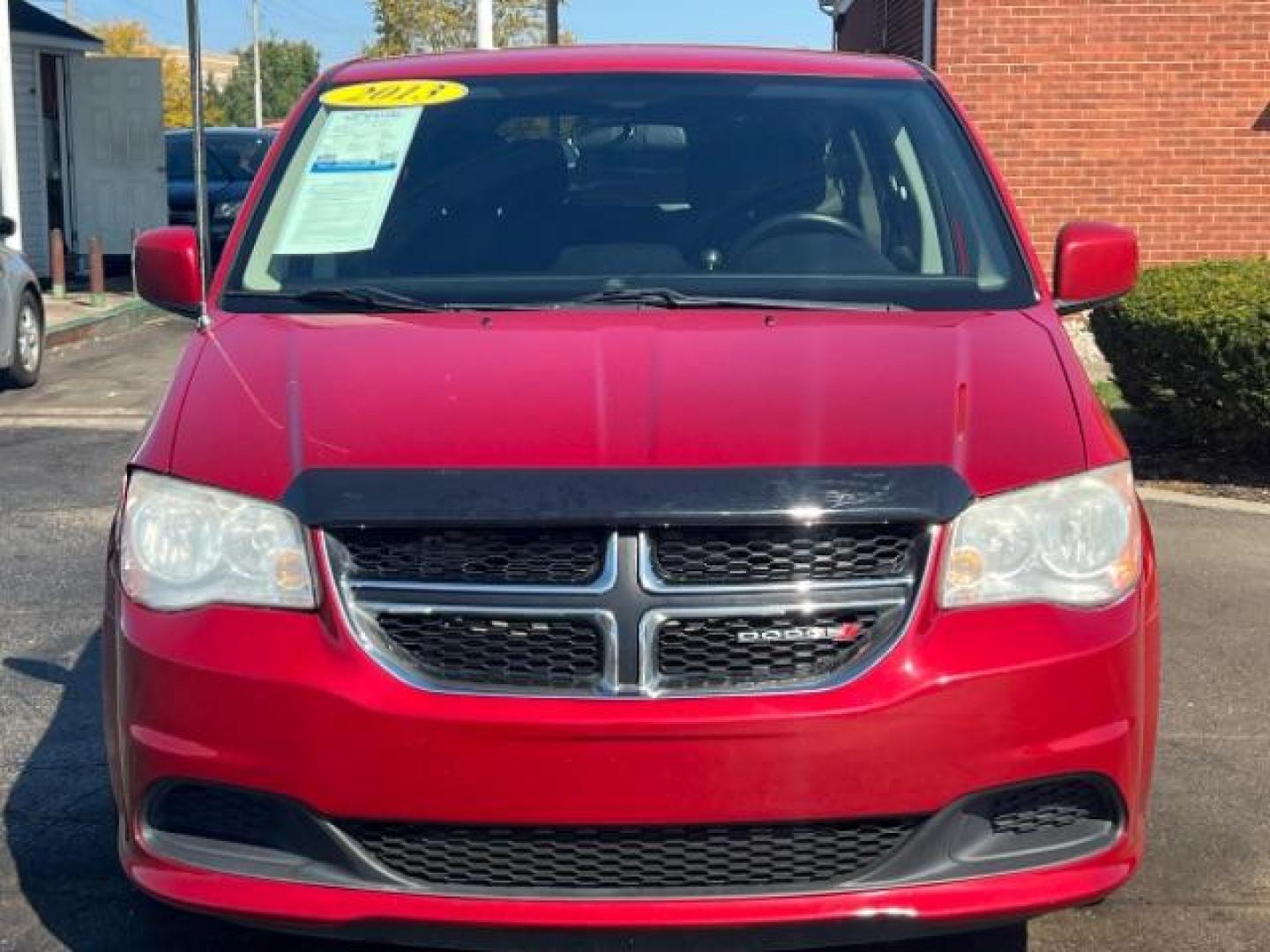 2013 Redline 2 Coat Pearl Dodge Grand Caravan SXT (2C4RDGCG1DR) with an 3.6L V6 DOHC 24V engine, 6-Speed Automatic transmission, located at 1230 East Main St, Xenia, OH, 45385, (937) 908-9800, 39.688026, -83.910172 - Photo#1