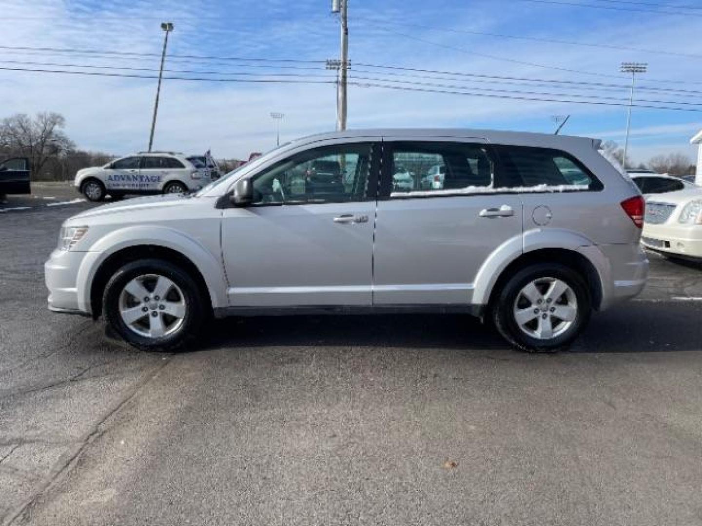 2013 Bright Silver Metallic Dodge Journey SE (3C4PDCAB1DT) with an 2.4L L4 DOHC 16V engine, 4-Speed Automatic transmission, located at 1184 Kauffman Ave, Fairborn, OH, 45324, (937) 908-9800, 39.807072, -84.030914 - Photo#2