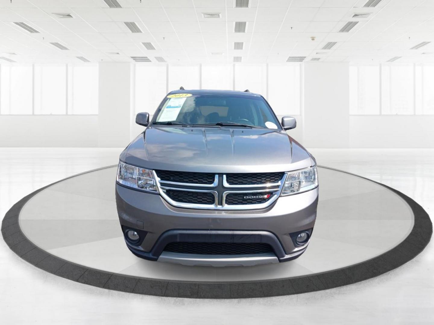 2013 Storm Grey Pearl Dodge Journey SXT (3C4PDCBB2DT) with an 2.4L L6 DOHC 16V engine, 4-Speed Automatic transmission, located at 1184 Kauffman Ave, Fairborn, OH, 45324, (937) 908-9800, 39.807072, -84.030914 - Photo#6