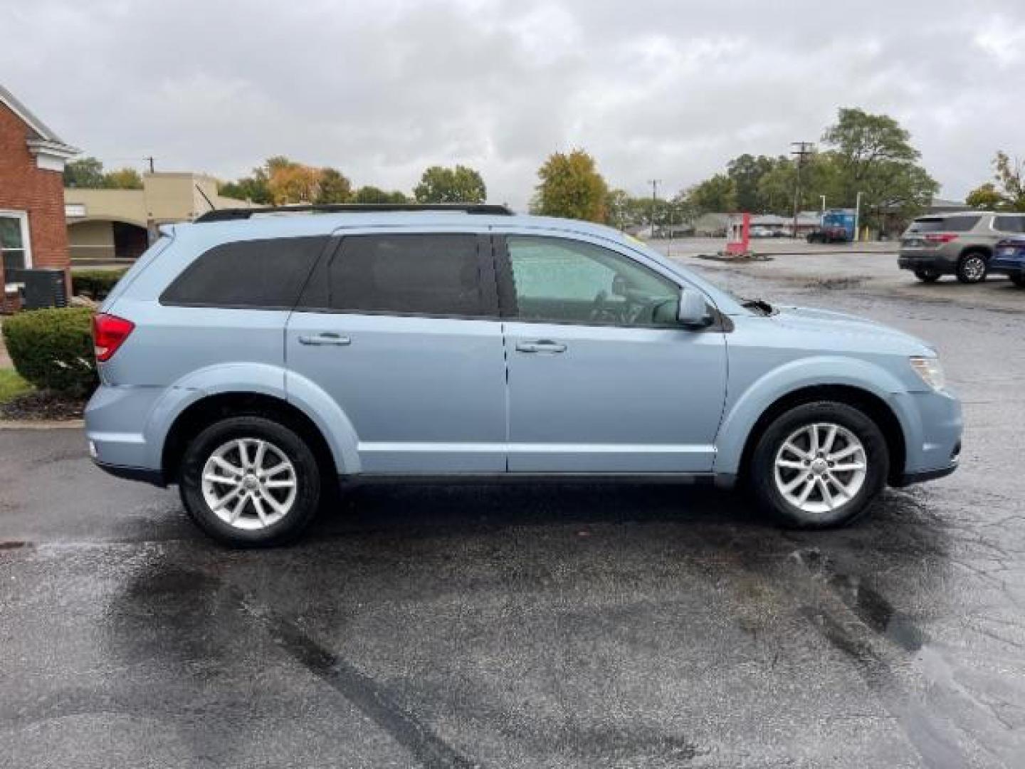 2013 Fathom Blue Pearl Dodge Journey SXT AWD (3C4PDDBGXDT) with an 3.6L V6 DOHC 24V engine, 6-Speed Automatic transmission, located at 1951 S Dayton Lakeview Rd., New Carlisle, OH, 45344, (937) 908-9800, 39.890999, -84.050255 - Third Row - Photo#4