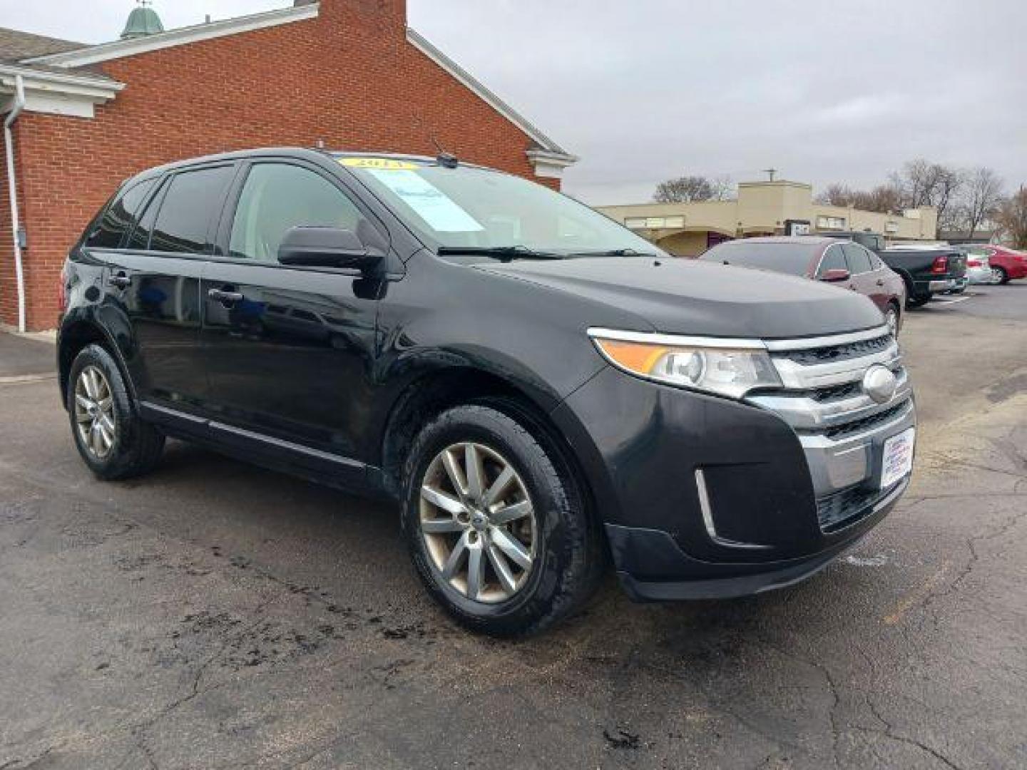 2013 Tuxedo Black Metallic Ford Edge SEL AWD (2FMDK4JC4DB) with an 3.5L V6 DOHC 24V engine, 6-Speed Automatic transmission, located at 4508 South Dixie Dr, Moraine, OH, 45439, (937) 908-9800, 39.689976, -84.218452 - Photo#0