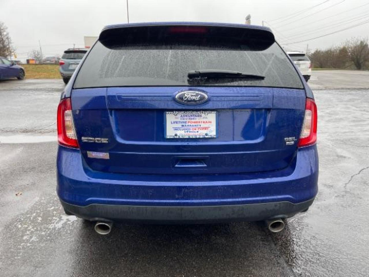 2013 Deep Impact Blue Metallic Ford Edge SEL AWD (2FMDK4JC7DB) with an 3.5L V6 DOHC 24V engine, 6-Speed Automatic transmission, located at 880 E. National Road, Vandalia, OH, 45377, (937) 908-9800, 39.891918, -84.183594 - Photo#4