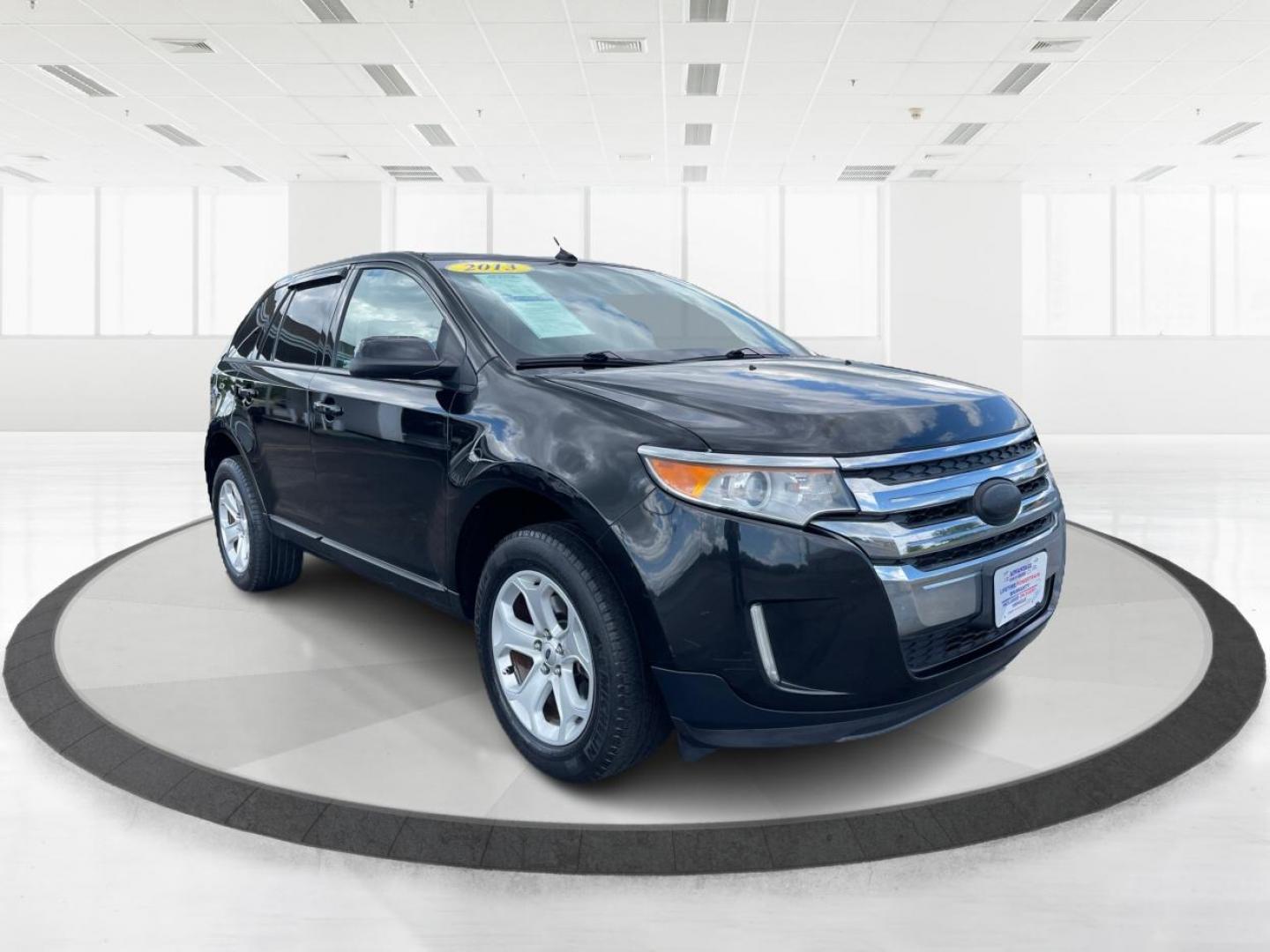 2013 Tuxedo Black Metallic Ford Edge SEL FWD (2FMDK3JC4DB) with an 3.5L V6 DOHC 24V engine, 6-Speed Automatic transmission, located at 880 E. National Road, Vandalia, OH, 45377, (937) 908-9800, 39.891918, -84.183594 - Photo#0