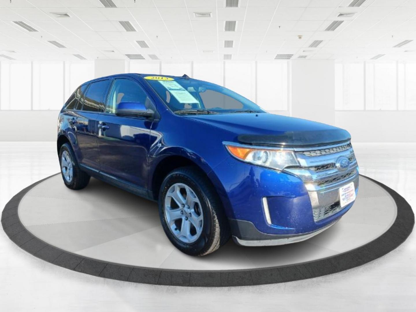 2013 Deep Impact Blue Metallic Ford Edge (2FMDK4JC4DB) with an 3.5L V6 DOHC 24V engine, 6-Speed Automatic transmission, located at 4508 South Dixie Dr, Moraine, OH, 45439, (937) 908-9800, 39.689976, -84.218452 - Photo#0