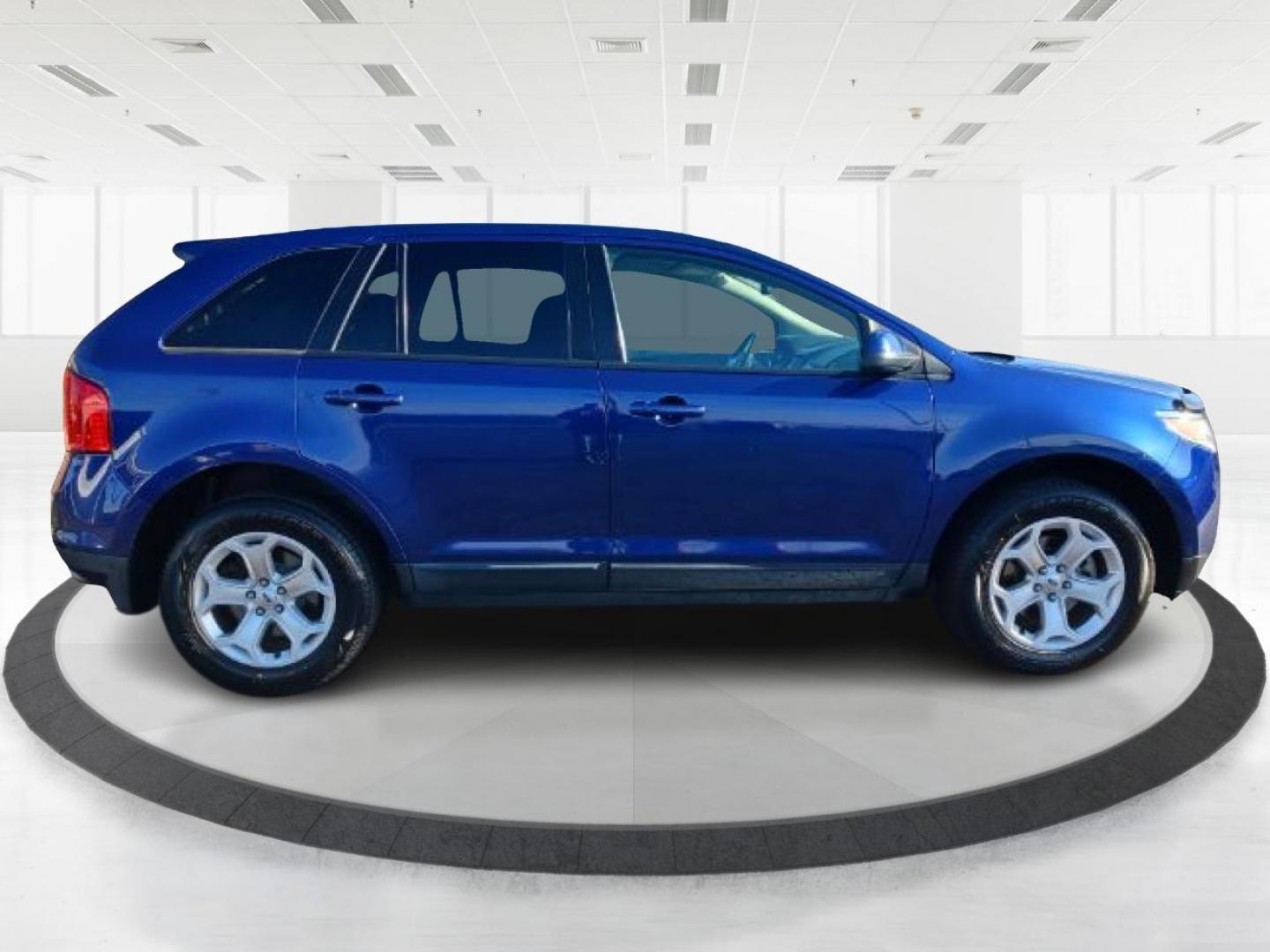 2013 Deep Impact Blue Metallic Ford Edge (2FMDK4JC4DB) with an 3.5L V6 DOHC 24V engine, 6-Speed Automatic transmission, located at 4508 South Dixie Dr, Moraine, OH, 45439, (937) 908-9800, 39.689976, -84.218452 - Photo#1