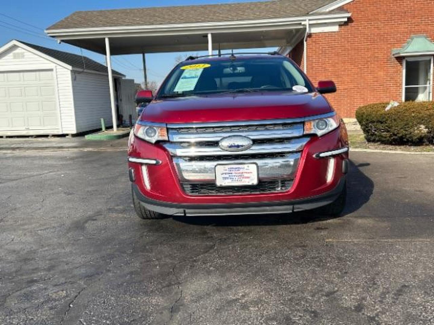 2013 Ruby Red Metallic Ford Edge SEL AWD (2FMDK4JC0DB) with an 3.5L V6 DOHC 24V engine, 6-Speed Automatic transmission, located at 1230 East Main St, Xenia, OH, 45385, (937) 908-9800, 39.688026, -83.910172 - Photo#1