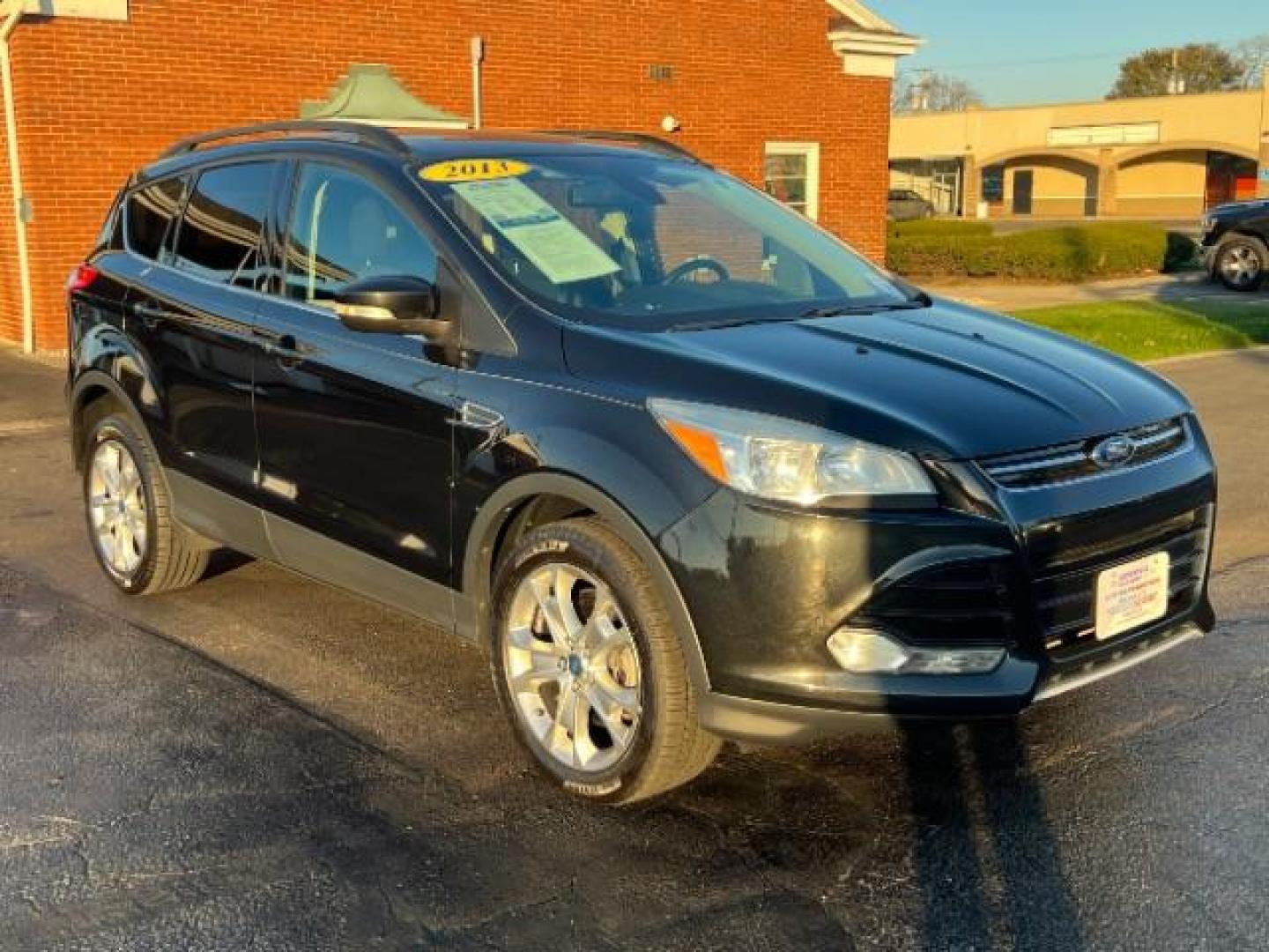 2013 Tuxedo Black Ford Escape SEL 4WD (1FMCU9H95DU) with an 2.0L L4 DOHC 16V engine, 6-Speed Automatic transmission, located at 401 Woodman Dr, Riverside, OH, 45431, (937) 908-9800, 39.760899, -84.123421 - Photo#0