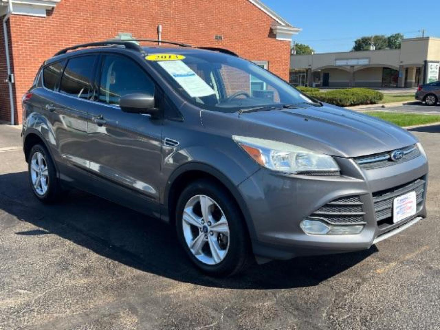 2013 Sterling Grey Metallic Ford Escape SE 4WD (1FMCU9G92DU) with an 2.0L L4 DOHC 16V engine, 6-Speed Automatic transmission, located at 4508 South Dixie Dr, Moraine, OH, 45439, (937) 908-9800, 39.689976, -84.218452 - Photo#0