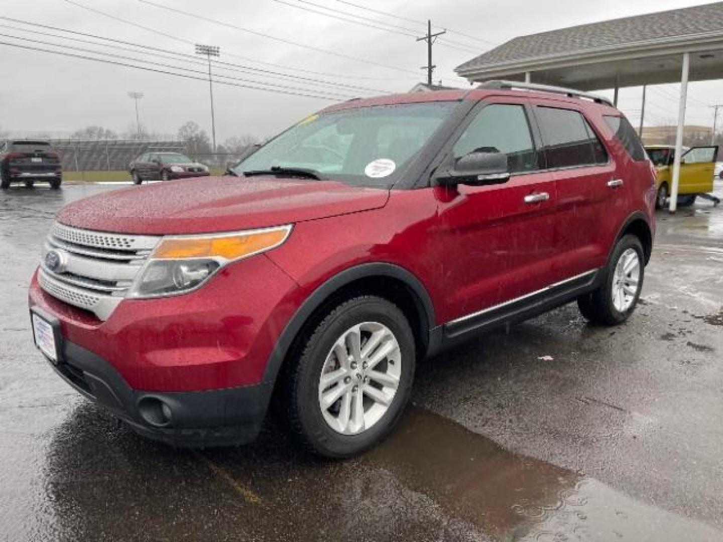 2013 Ruby Red Metallic Ford Explorer XLT 4WD (1FM5K8D83DG) with an 3.5L V6 DOHC 24V engine, 6-Speed Automatic transmission, located at 1099 N County Rd 25A, Troy, OH, 45373, (937) 908-9800, 40.057079, -84.212883 - Photo#1