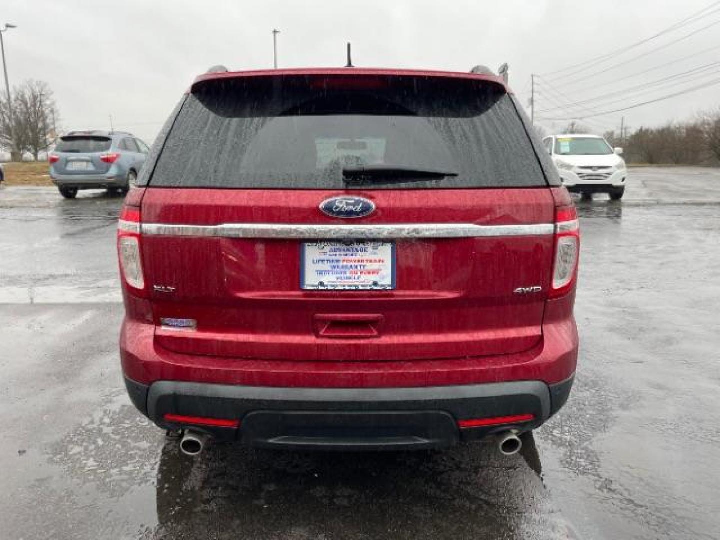 2013 Ruby Red Metallic Ford Explorer XLT 4WD (1FM5K8D83DG) with an 3.5L V6 DOHC 24V engine, 6-Speed Automatic transmission, located at 1099 N County Rd 25A, Troy, OH, 45373, (937) 908-9800, 40.057079, -84.212883 - Photo#4