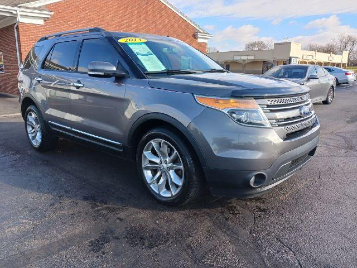 2013 Sterling Grey Metallic Ford Explorer Limited 4WD (1FM5K8F81DG) with an 3.5L V6 DOHC 24V engine, 6-Speed Automatic transmission, located at 1951 S Dayton Lakeview Rd., New Carlisle, OH, 45344, (937) 908-9800, 39.890999, -84.050255 - Photo#0