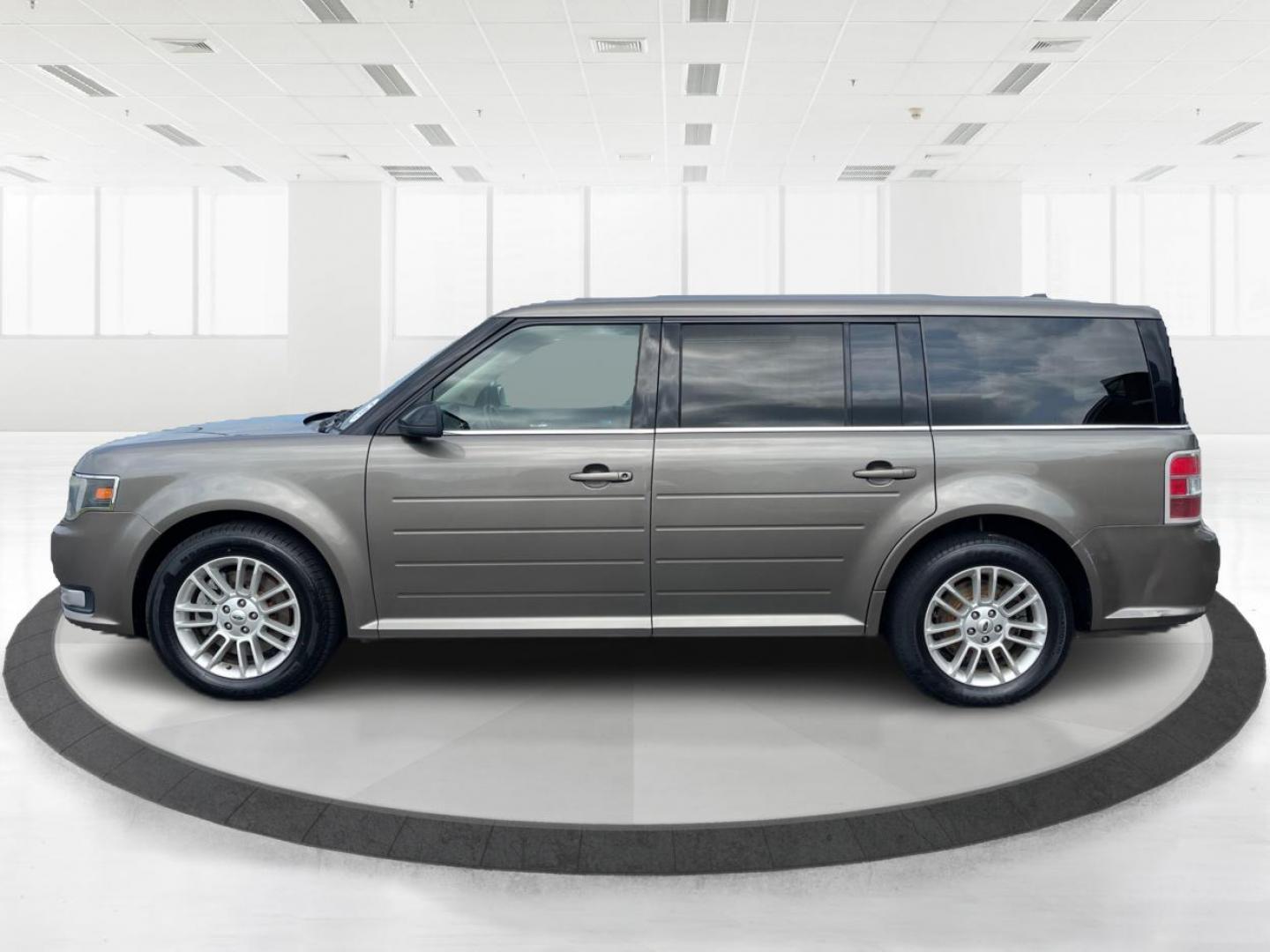 2013 Mineral Gray Metallic Ford Flex SEL FWD (2FMGK5C85DB) with an 3.5L V6 DOHC 24V engine, 6-Speed Automatic Overdrive transmission, located at 4508 South Dixie Dr, Moraine, OH, 45439, (937) 908-9800, 39.689976, -84.218452 - Third Row - Photo#5