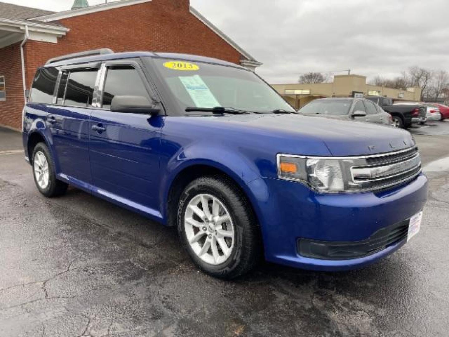 2013 Deep Impact Blue Metallic Ford Flex SE FWD (2FMGK5B8XDB) with an 3.5L V6 DOHC 24V engine, 6-Speed Automatic Overdrive transmission, located at 1951 S Dayton Lakeview Rd., New Carlisle, OH, 45344, (937) 908-9800, 39.890999, -84.050255 - Photo#0