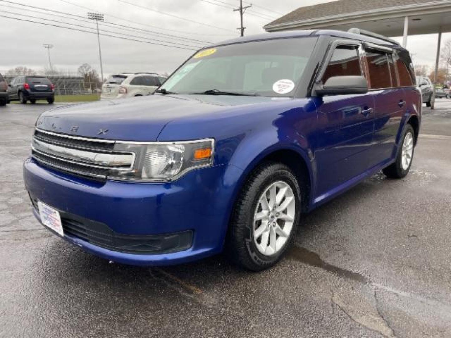 2013 Deep Impact Blue Metallic Ford Flex SE FWD (2FMGK5B8XDB) with an 3.5L V6 DOHC 24V engine, 6-Speed Automatic Overdrive transmission, located at 1951 S Dayton Lakeview Rd., New Carlisle, OH, 45344, (937) 908-9800, 39.890999, -84.050255 - Photo#1