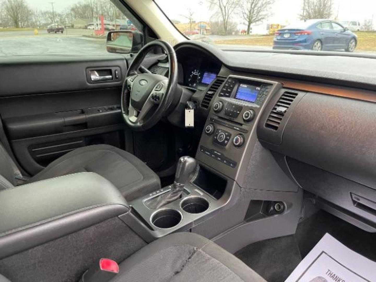 2013 Deep Impact Blue Metallic Ford Flex SE FWD (2FMGK5B8XDB) with an 3.5L V6 DOHC 24V engine, 6-Speed Automatic Overdrive transmission, located at 1951 S Dayton Lakeview Rd., New Carlisle, OH, 45344, (937) 908-9800, 39.890999, -84.050255 - Photo#8