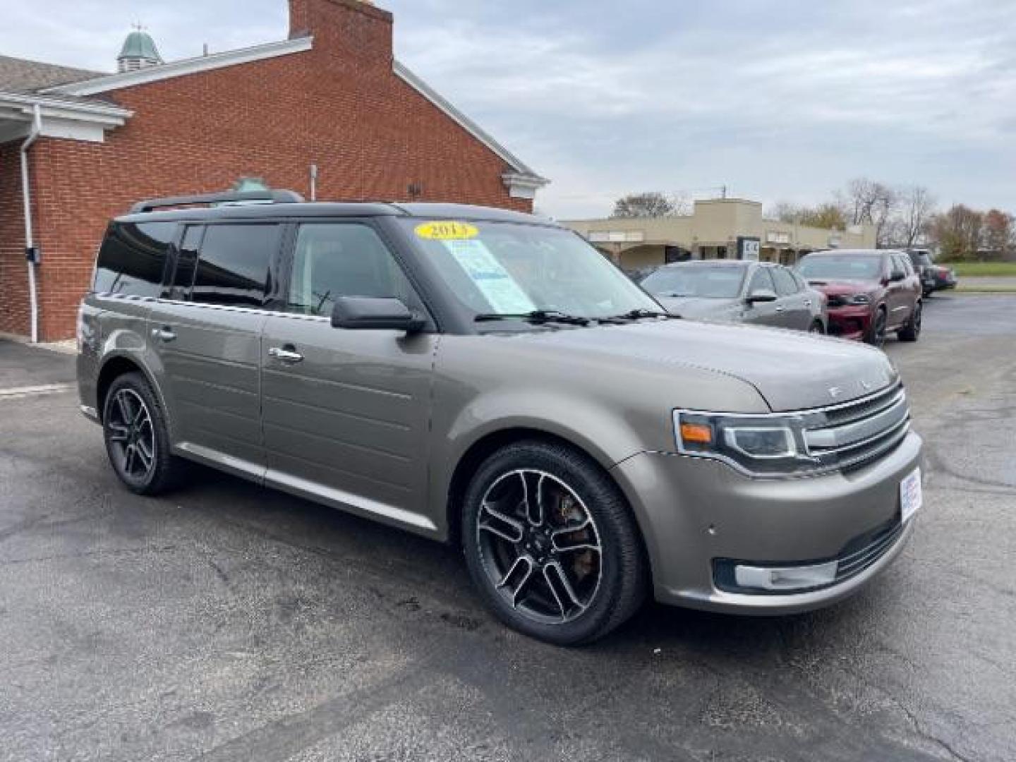 2013 Mineral Gray Metallic Ford Flex Limited AWD (2FMHK6DT2DB) with an 3.5L V6 DOHC 24V engine, 6-Speed Automatic Overdrive transmission, located at 1099 N County Rd 25A, Troy, OH, 45373, (937) 908-9800, 40.057079, -84.212883 - Photo#0