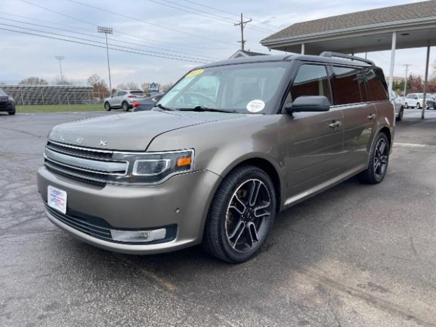 2013 Mineral Gray Metallic Ford Flex Limited AWD (2FMHK6DT2DB) with an 3.5L V6 DOHC 24V engine, 6-Speed Automatic Overdrive transmission, located at 1099 N County Rd 25A, Troy, OH, 45373, (937) 908-9800, 40.057079, -84.212883 - Photo#1