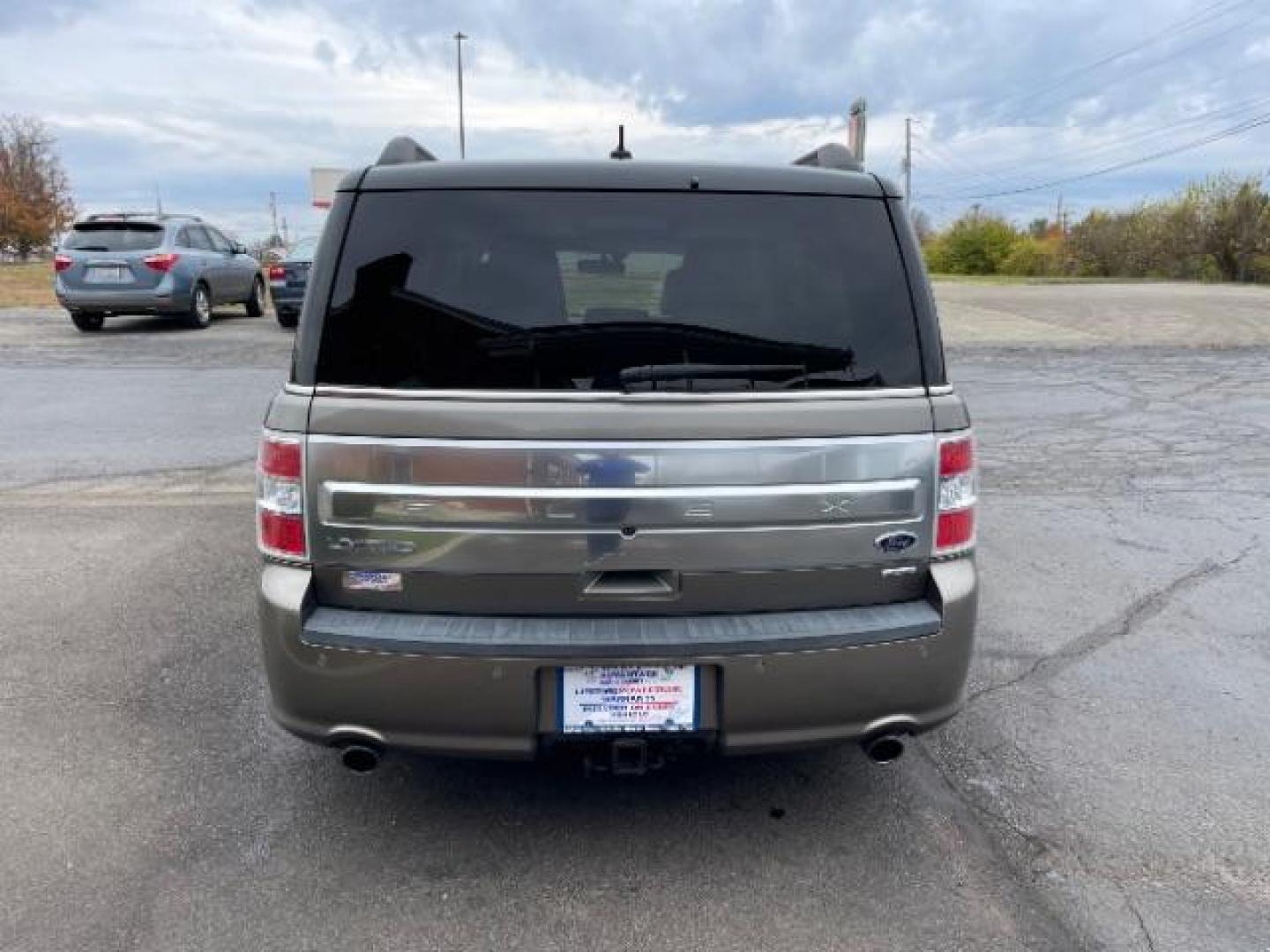 2013 Mineral Gray Metallic Ford Flex Limited AWD (2FMHK6DT2DB) with an 3.5L V6 DOHC 24V engine, 6-Speed Automatic Overdrive transmission, located at 1099 N County Rd 25A, Troy, OH, 45373, (937) 908-9800, 40.057079, -84.212883 - Photo#3