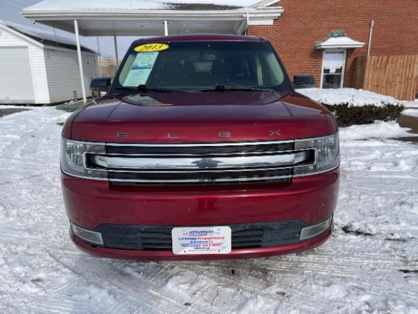 2013 Ruby Red Metallic Tinted Ford Flex SEL FWD (2FMGK5C84DB) with an 3.5L V6 DOHC 24V engine, 6-Speed Automatic Overdrive transmission, located at 1099 N County Rd 25A, Troy, OH, 45373, (937) 908-9800, 40.057079, -84.212883 - Photo#2