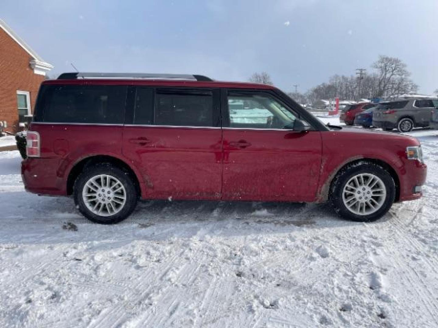 2013 Ruby Red Metallic Tinted Ford Flex SEL FWD (2FMGK5C84DB) with an 3.5L V6 DOHC 24V engine, 6-Speed Automatic Overdrive transmission, located at 1099 N County Rd 25A, Troy, OH, 45373, (937) 908-9800, 40.057079, -84.212883 - Photo#5