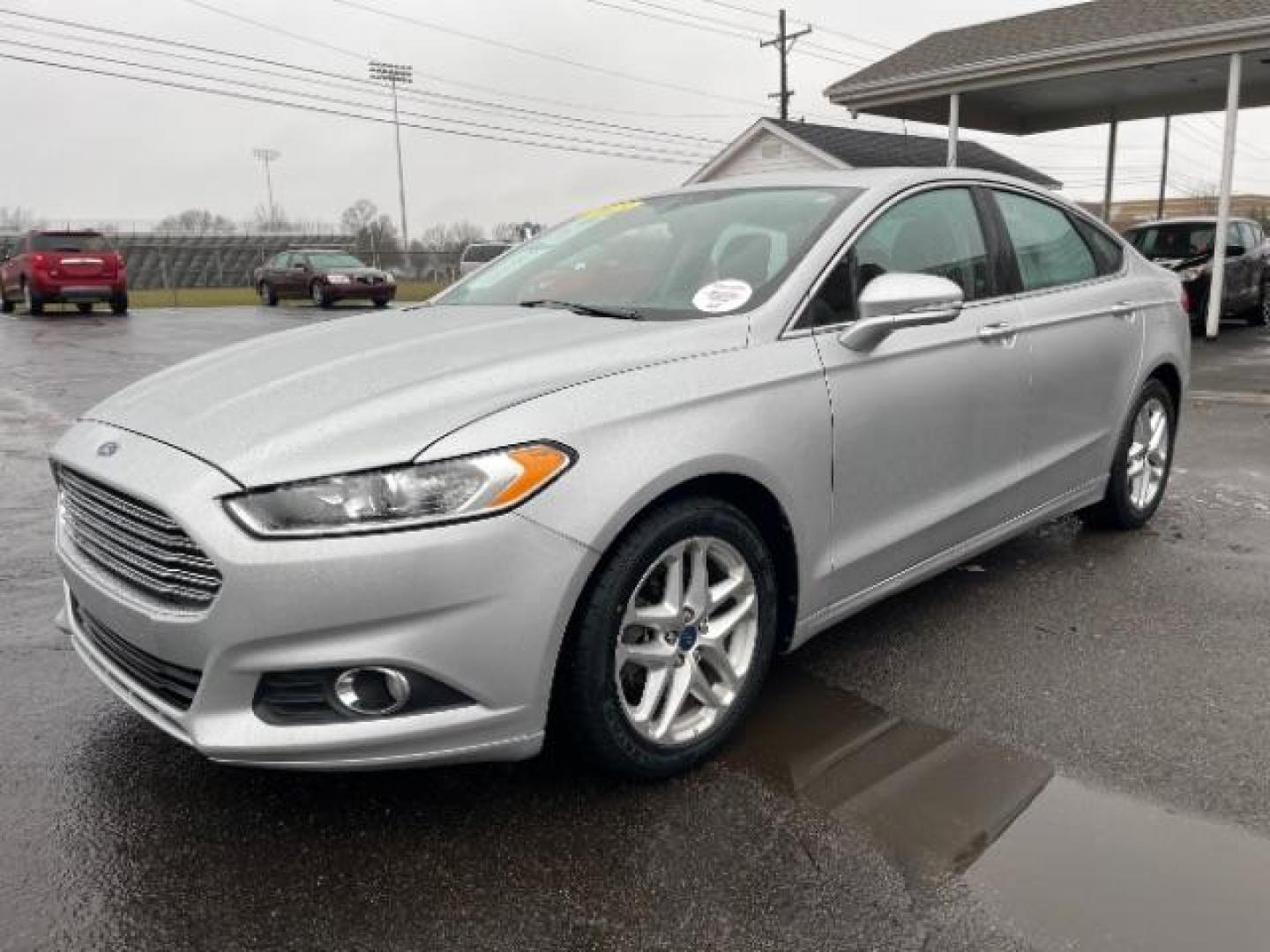 2013 Ingot Silver Ford Fusion SE (3FA6P0HR5DR) with an 1.6L L4 DOHC 16V engine, located at 1099 N County Rd 25A, Troy, OH, 45373, (937) 908-9800, 40.057079, -84.212883 - Photo#1