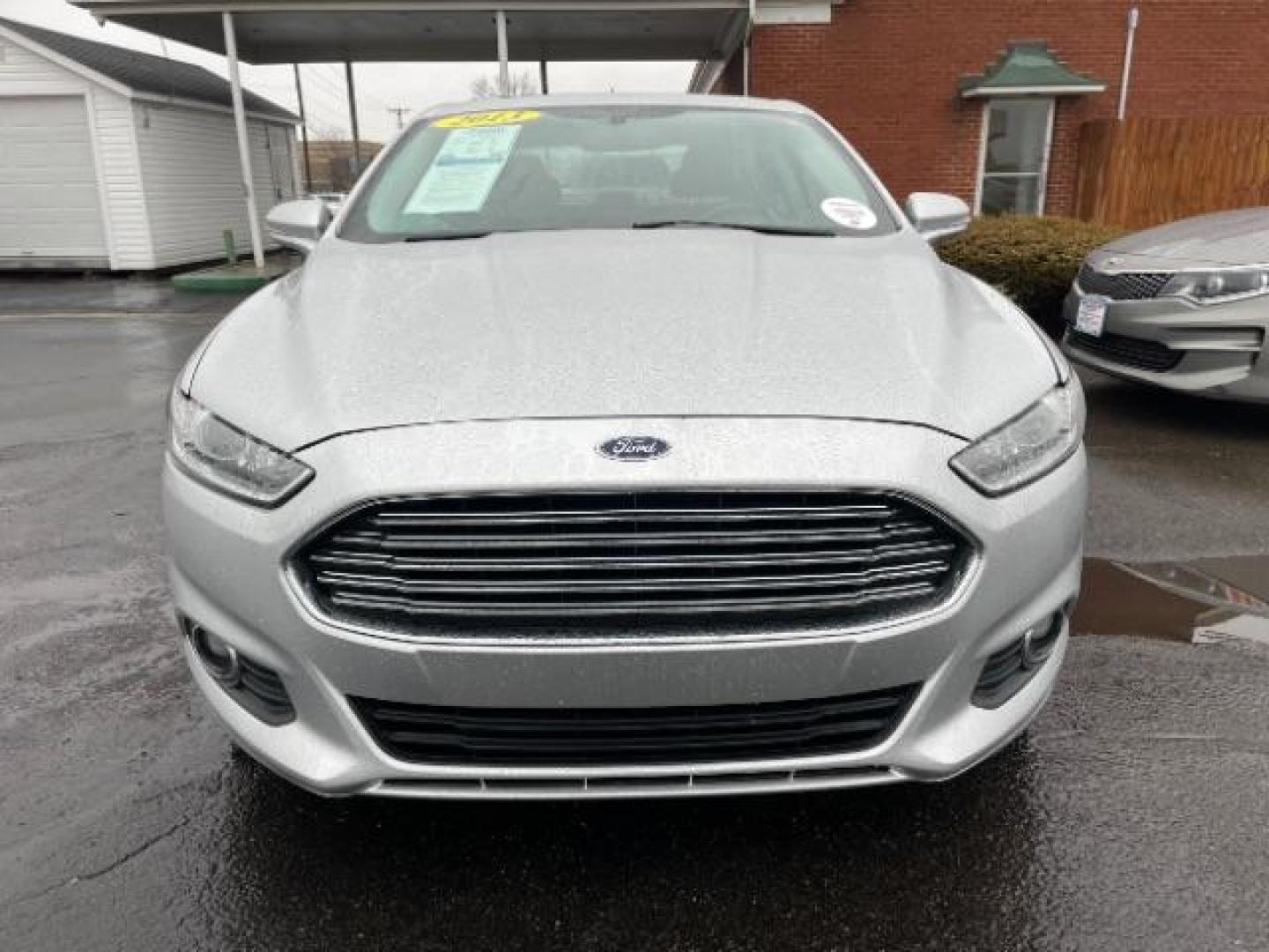 2013 Ingot Silver Ford Fusion SE (3FA6P0HR5DR) with an 1.6L L4 DOHC 16V engine, located at 1099 N County Rd 25A, Troy, OH, 45373, (937) 908-9800, 40.057079, -84.212883 - Photo#2