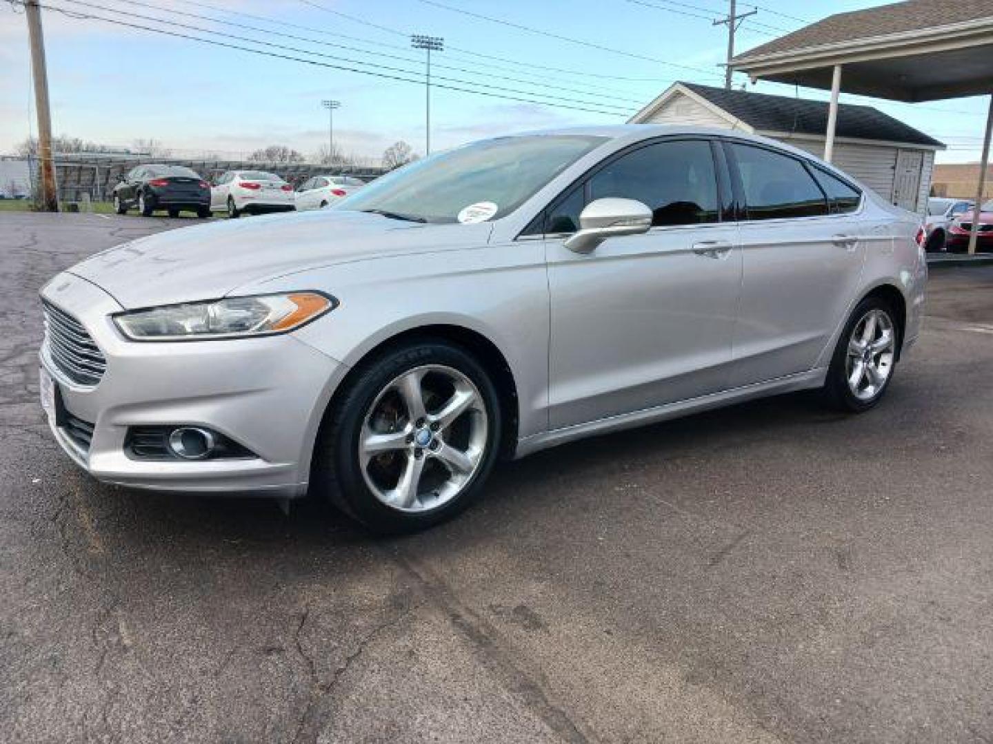 2013 Ingot Silver Ford Fusion SE (3FA6P0H95DR) with an 2.0L L4 DOHC 16V engine, located at 1184 Kauffman Ave, Fairborn, OH, 45324, (937) 908-9800, 39.807072, -84.030914 - Photo#2