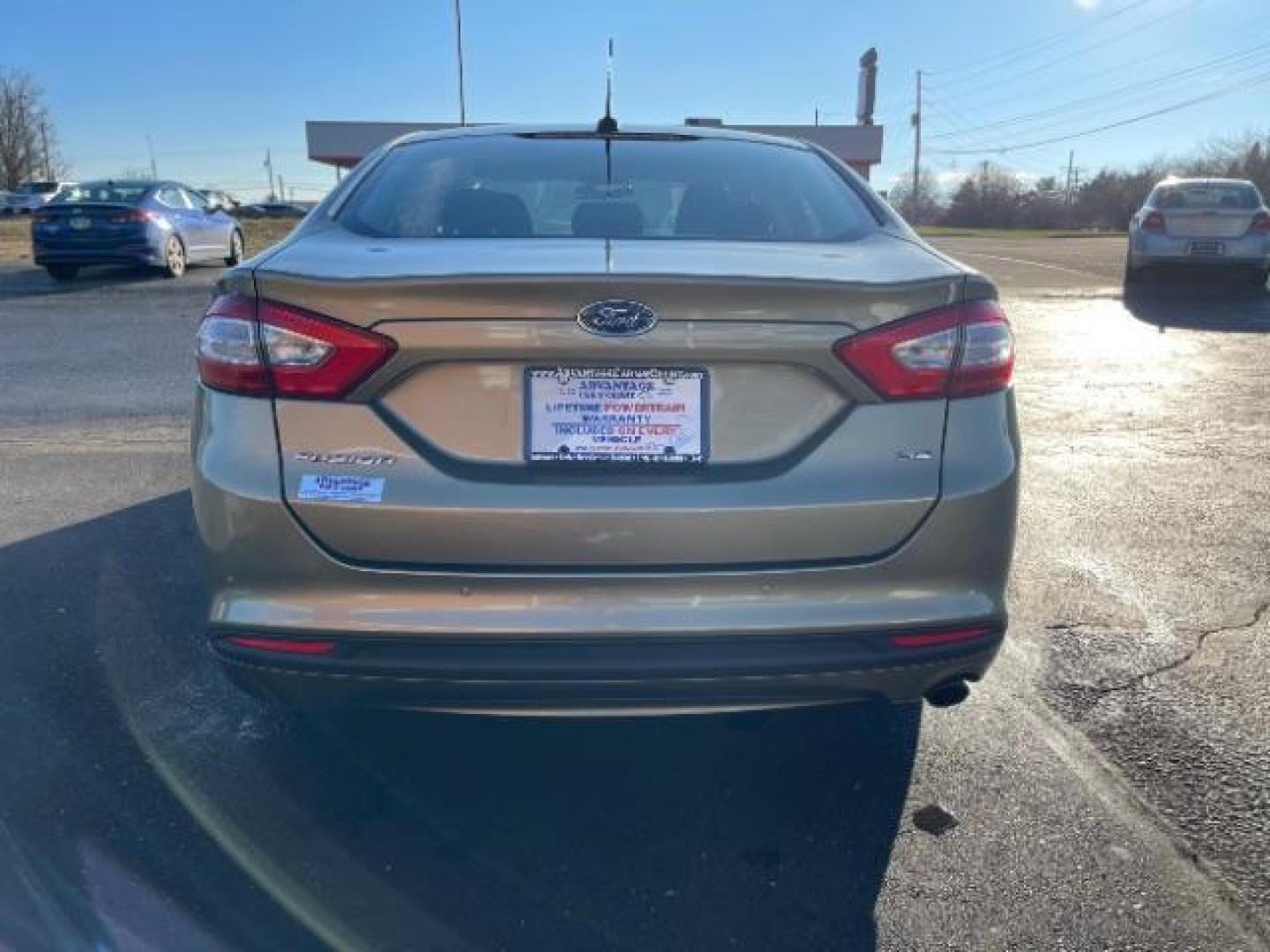 2013 Ginger Ale Ford Fusion SE (3FA6P0H73DR) with an 2.5L L4 DOHC 16V engine, located at 4508 South Dixie Dr, Moraine, OH, 45439, (937) 908-9800, 39.689976, -84.218452 - Photo#4