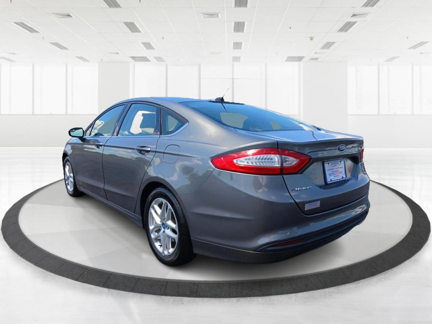 2013 Sterling Gray Ford Fusion (3FA6P0H78DR) with an 2.5L L4 DOHC 16V engine, located at 4508 South Dixie Dr, Moraine, OH, 45439, (937) 908-9800, 39.689976, -84.218452 - Photo#4