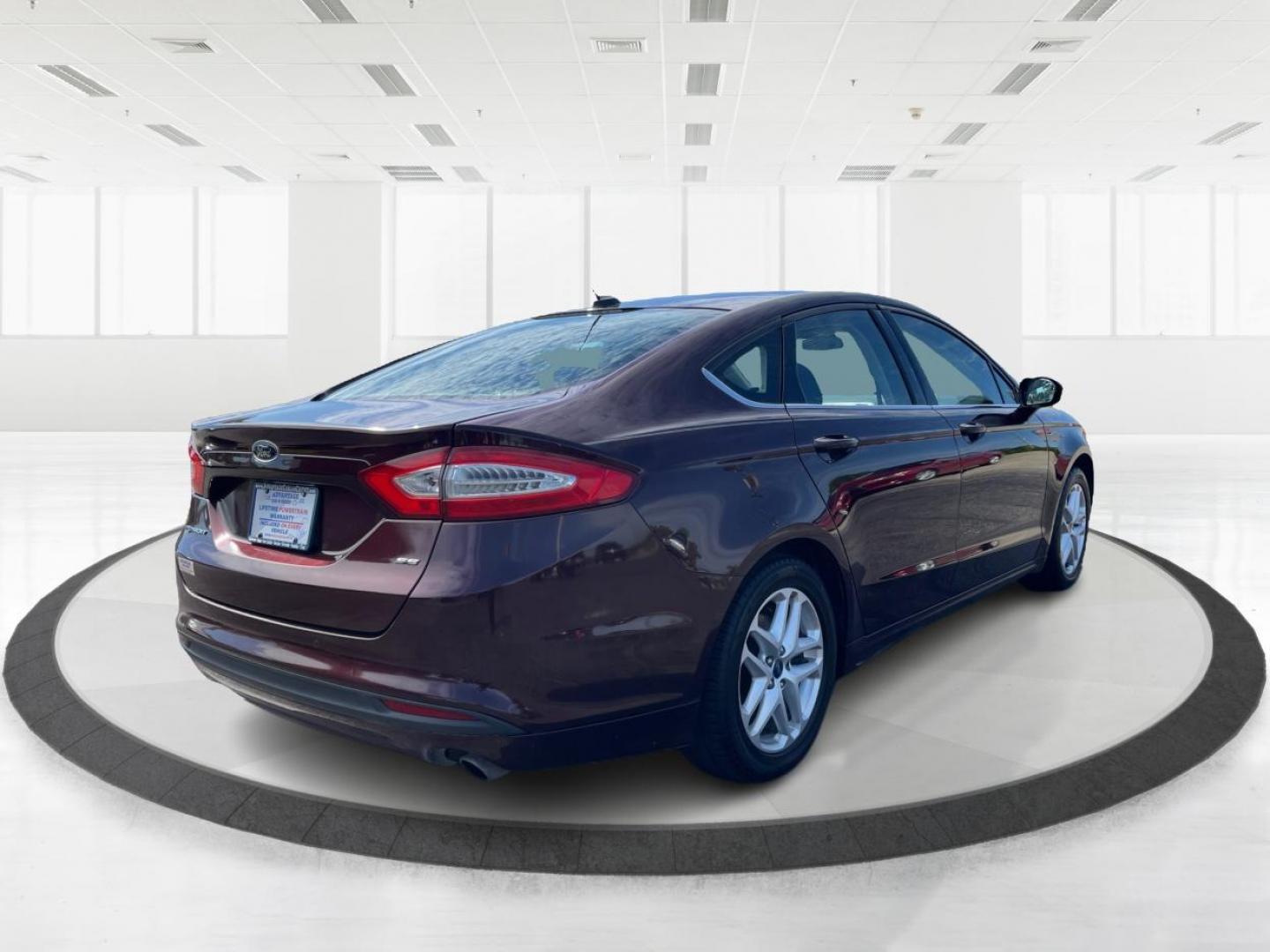 2013 Bordeaux Reserve Ford Fusion (3FA6P0H76DR) with an 2.5L L4 DOHC 16V engine, located at 1951 S Dayton Lakeview Rd., New Carlisle, OH, 45344, (937) 908-9800, 39.890999, -84.050255 - Photo#2