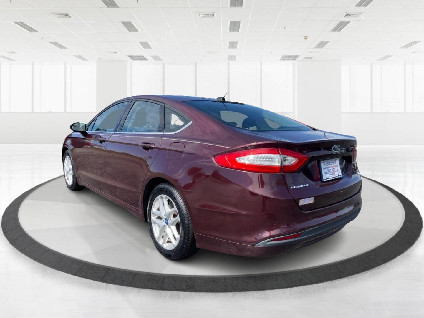 2013 Bordeaux Reserve Ford Fusion (3FA6P0H76DR) with an 2.5L L4 DOHC 16V engine, located at 1951 S Dayton Lakeview Rd., New Carlisle, OH, 45344, (937) 908-9800, 39.890999, -84.050255 - Photo#4