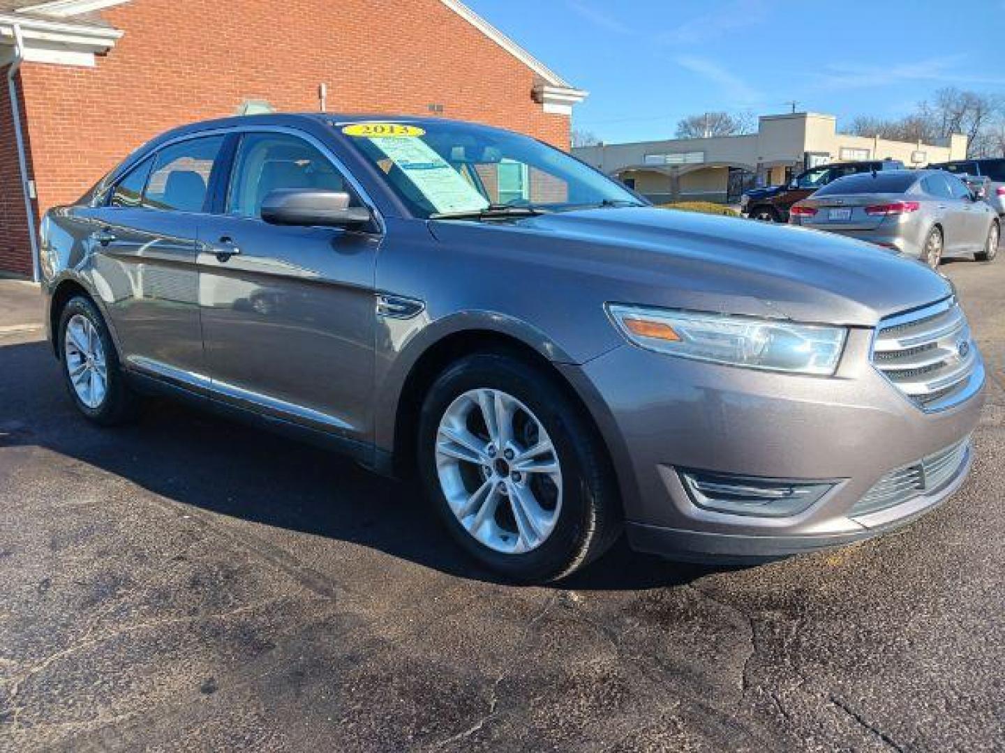 2013 Sterling Gray Metallic Ford Taurus SEL FWD (1FAHP2E81DG) with an 3.5L V6 DOHC 24V engine, 6-Speed Automatic transmission, located at 1951 S Dayton Lakeview Rd., New Carlisle, OH, 45344, (937) 908-9800, 39.890999, -84.050255 - Photo#0