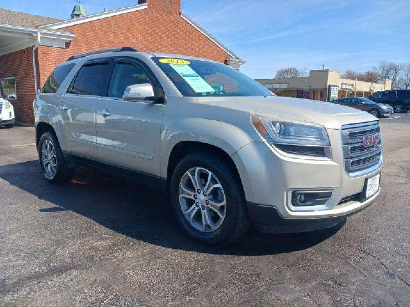 2013 Champagne Silver Metallic GMC Acadia SLT-1 AWD (1GKKVRKD0DJ) with an 3.6L V6 DOHC 24V engine, 6-Speed Automatic transmission, located at 401 Woodman Dr, Riverside, OH, 45431, (937) 908-9800, 39.760899, -84.123421 - Photo#0