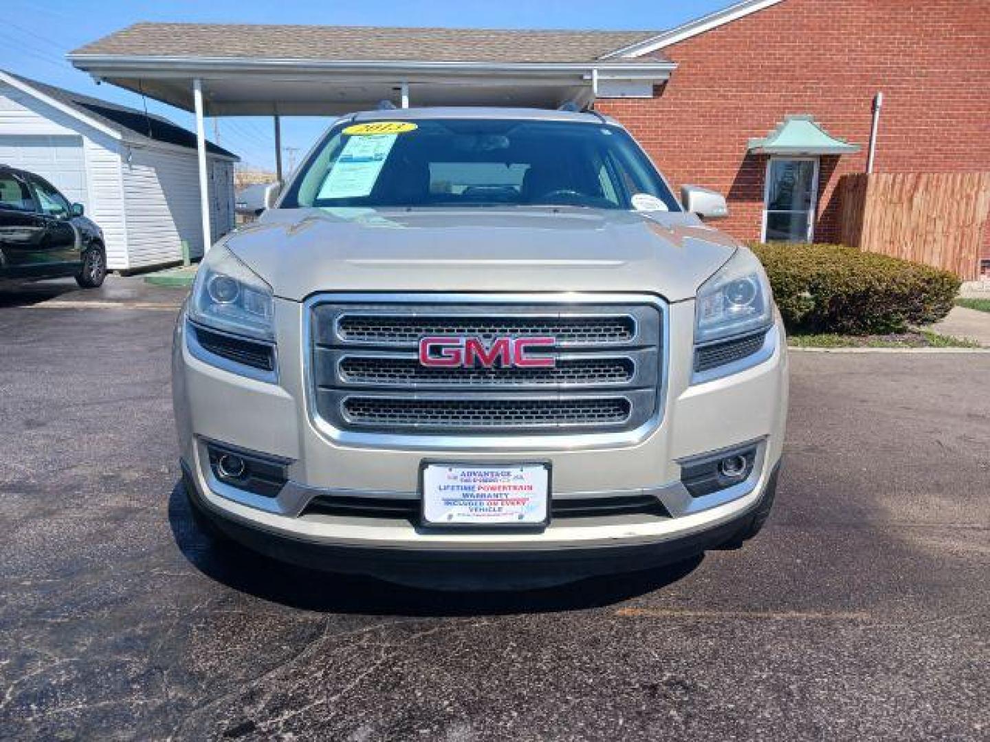 2013 Champagne Silver Metallic GMC Acadia SLT-1 AWD (1GKKVRKD0DJ) with an 3.6L V6 DOHC 24V engine, 6-Speed Automatic transmission, located at 401 Woodman Dr, Riverside, OH, 45431, (937) 908-9800, 39.760899, -84.123421 - Photo#1