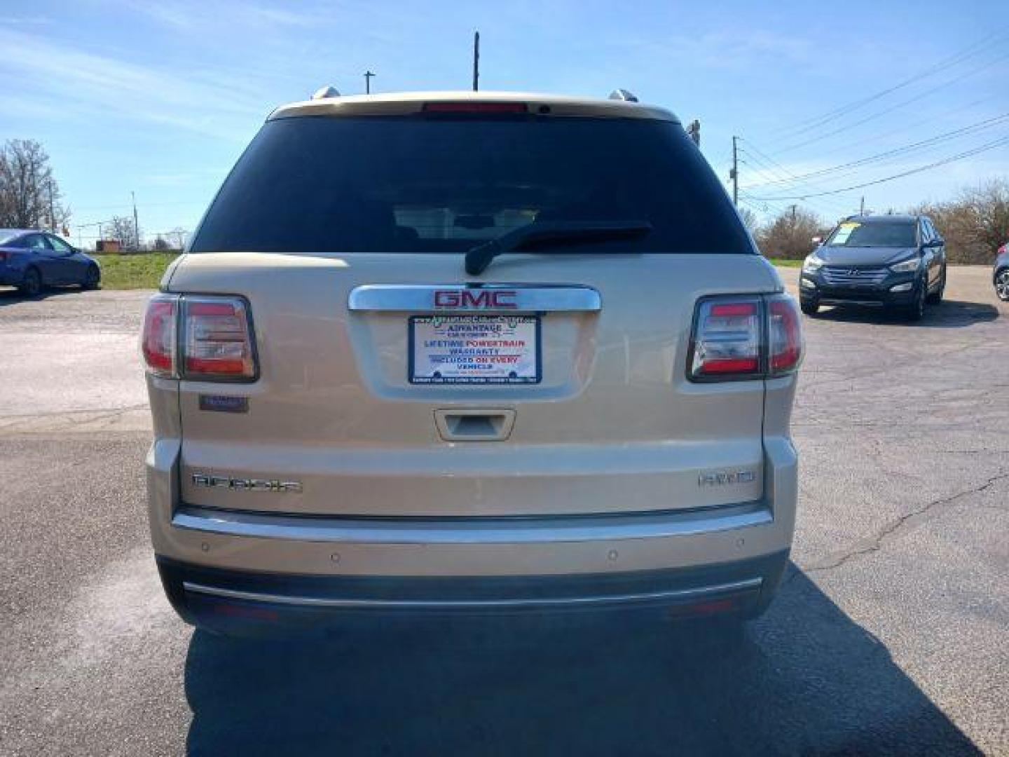 2013 Champagne Silver Metallic GMC Acadia SLT-1 AWD (1GKKVRKD0DJ) with an 3.6L V6 DOHC 24V engine, 6-Speed Automatic transmission, located at 401 Woodman Dr, Riverside, OH, 45431, (937) 908-9800, 39.760899, -84.123421 - Photo#5