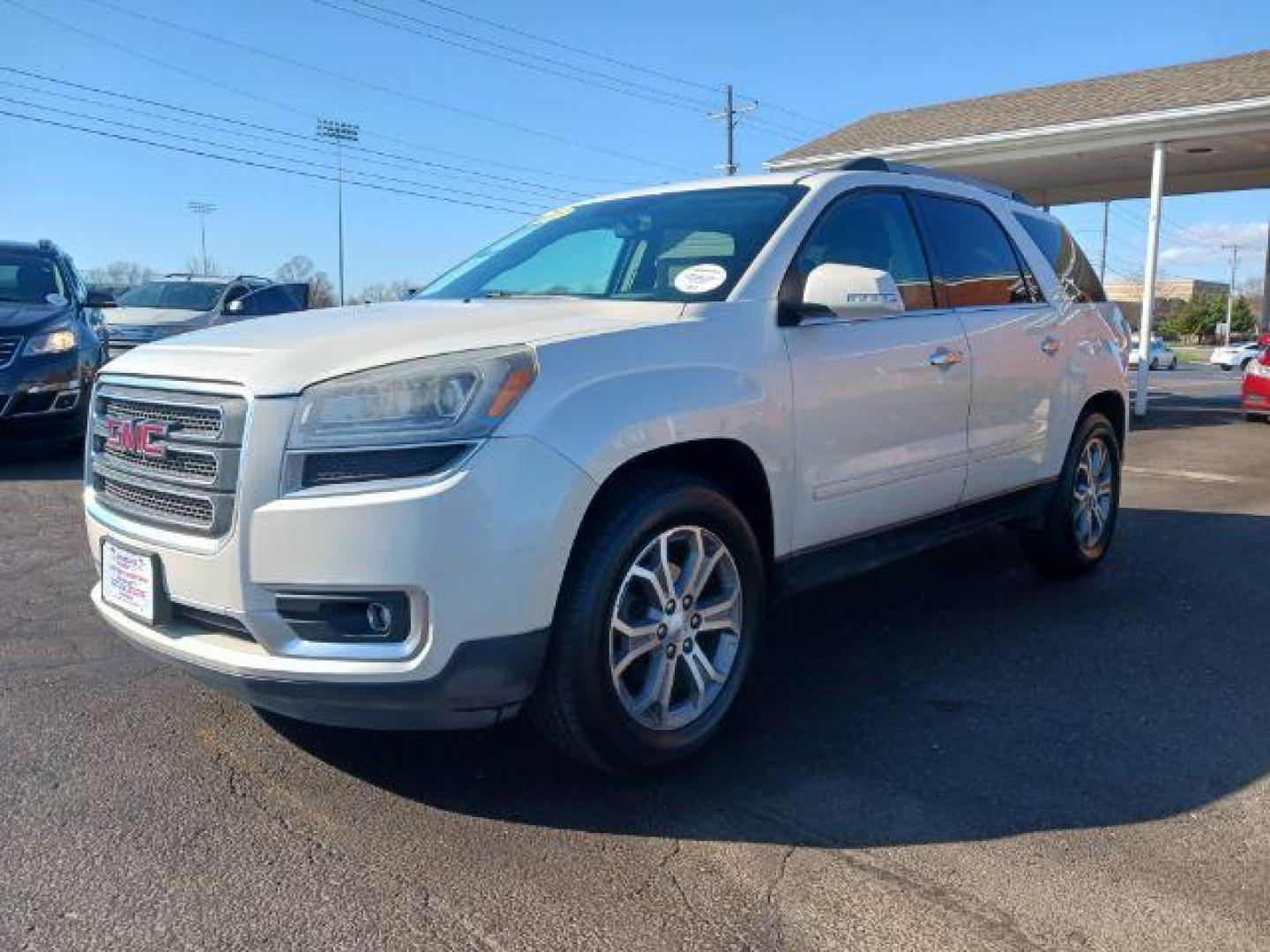 2013 Summit White GMC Acadia SLT-2 AWD (1GKKVSKD3DJ) with an 3.6L V6 DOHC 24V engine, 6-Speed Automatic transmission, located at 1230 East Main St, Xenia, OH, 45385, (937) 908-9800, 39.688026, -83.910172 - Photo#2