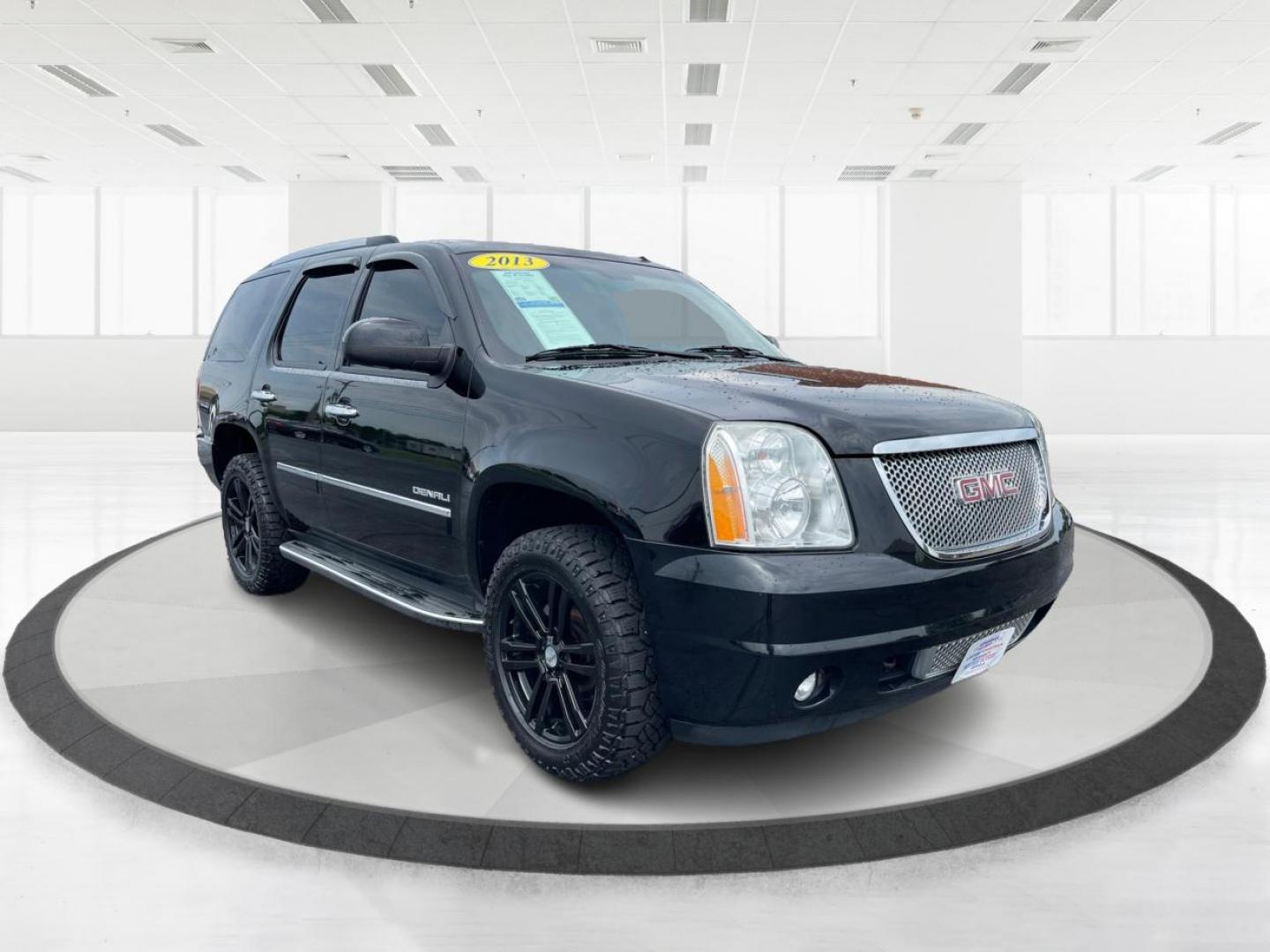 2013 Carbon Black Metallic GMC Yukon Denali 4WD (1GKS2EEF0DR) with an 6.2L V8 OHV 16V engine, 6-Speed Automatic transmission, located at 1951 S Dayton Lakeview Rd., New Carlisle, OH, 45344, (937) 908-9800, 39.890999, -84.050255 - Photo#0