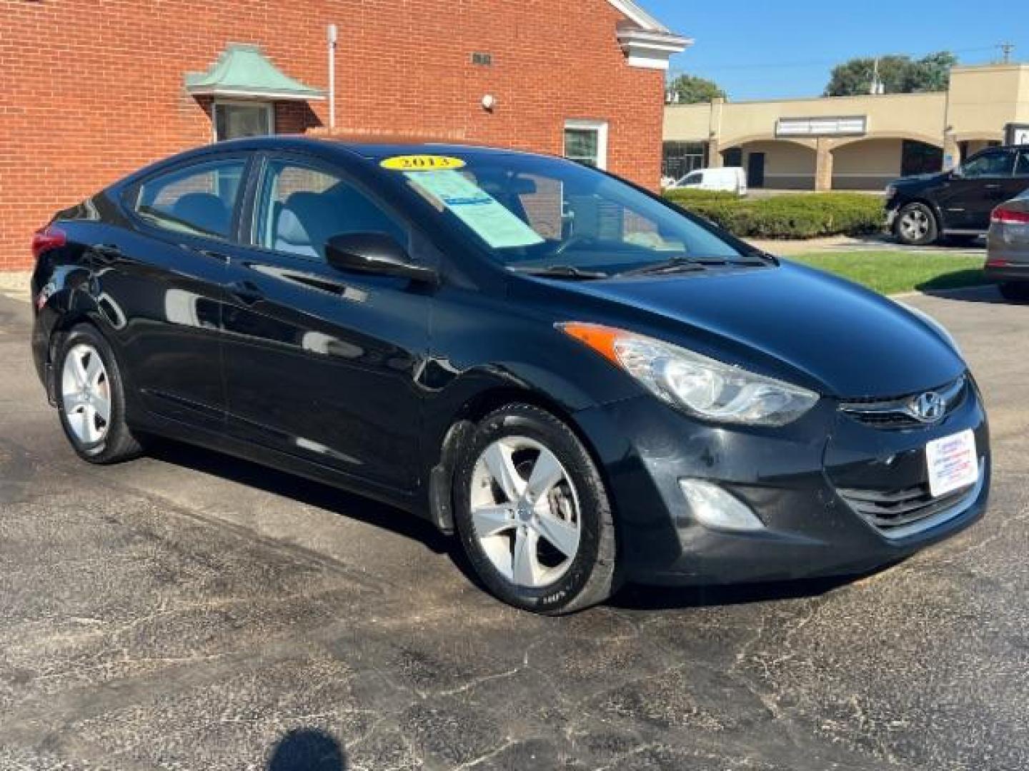 2013 Midnight Black Metallic Hyundai Elantra Limited (5NPDH4AE7DH) with an 1.8L L4 DOHC 16V engine, 6-Speed Automatic transmission, located at 1184 Kauffman Ave, Fairborn, OH, 45324, (937) 908-9800, 39.807072, -84.030914 - Photo#0