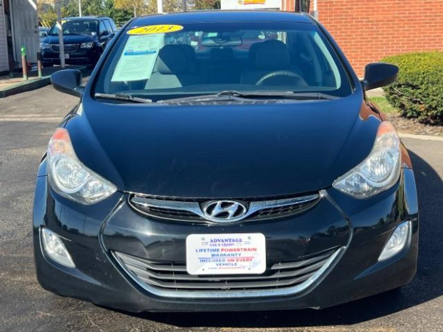 2013 Midnight Black Metallic Hyundai Elantra Limited (5NPDH4AE7DH) with an 1.8L L4 DOHC 16V engine, 6-Speed Automatic transmission, located at 1184 Kauffman Ave, Fairborn, OH, 45324, (937) 908-9800, 39.807072, -84.030914 - Photo#1